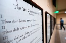 The Ten Commandments listed on a whiteboard in a classroom.