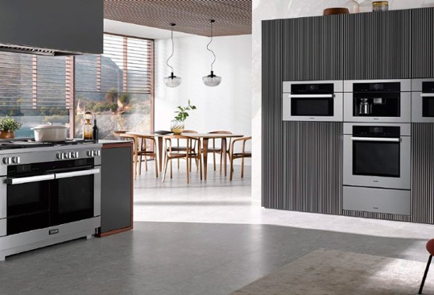 Dark gray kitchen with built-in appliances