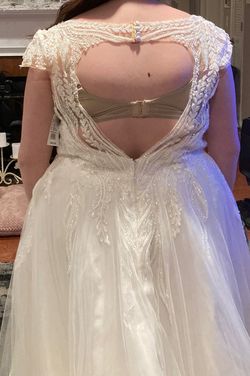 Style V10003 N/S Ivory with Cathedral Matching Veil priced at $279.00 Oleg Cassini White Size 18 Wedding Floor Length Jersey A-line Dress on Queenly