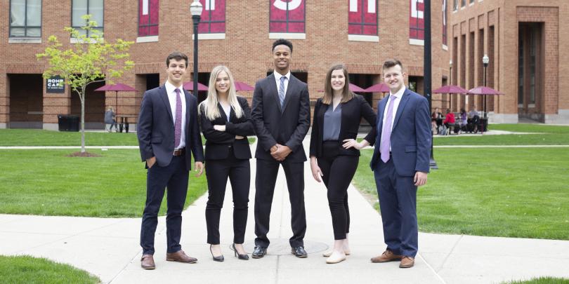 Fisher students in business professional wear