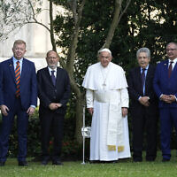 Pope Francis (center) poses for a photo with Raphael Schutz, the Israeli ambassador to the Holy See (first from left), Rabbi Abramo Alberto Funaro (second from left), Redouane Abdellah of Rome's Islamic Center (second from right) and Issa Kassissieh, the Palestinian Authority's ambassador to the Holy See (first from right) after an evening of peace prayers in the Vatican Gardens, at the Vatican, June 7, 2024. (Alessandra Tarantino / POOL / AFP)