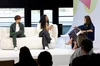 YouTube Chief Business Officer Mary Ellen Coe on stage with creators Alan Chikin Chow and Jade Beason