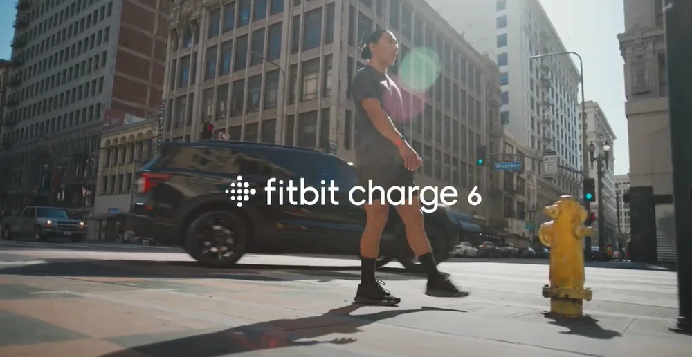 Video of men and women exercising and interacting while all wearing Charge 6