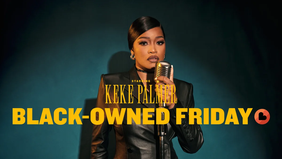 Keke Palmer holding a microphone against a dark green background. The words "Starring Keke Palmer, Black-owned Friday" are overlayed in yellow text.
