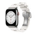 Image montrant le bracelet Kilim simple tour blanc, le cadran d’une Apple Watch et la Digital Crown.
