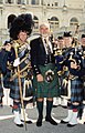 Sean Connery with members of the United States Air Force Reserve's Pipe and Drum Band in Washington, DC.