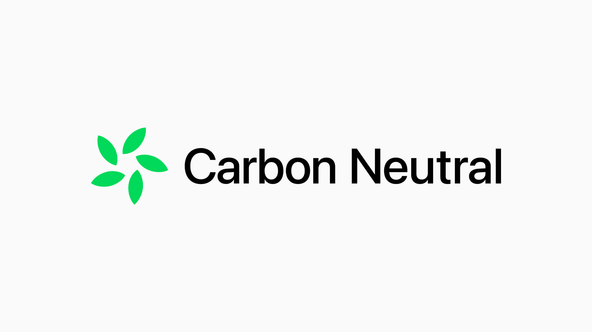 Logo baru untuk inisiatif netral karbon Apple.
