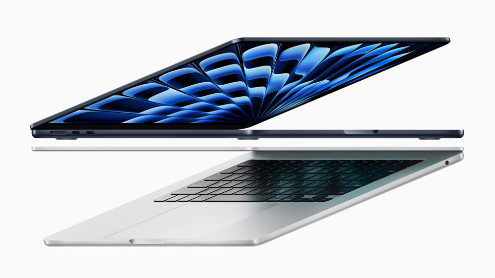 Dois notebooks MacBook Air novos são mostrados parcialmente abertos e de lado.