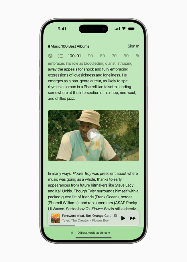 Layar iPhone 15 Pro menampilkan informasi mengenai album “Flower Boy” dari situs mikro 100 Album Terbaik.