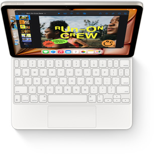 Bovenaanzicht van iPad Air met wit Magic Keyboard.