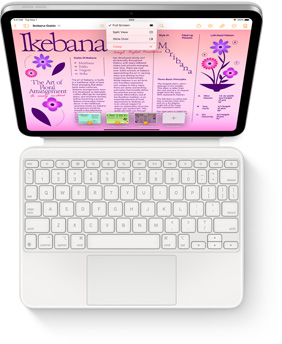 Valge Magic Keyboard Folioga iPadi ülalt alla vaade.