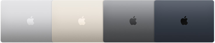 Vue du dessus de quatre MacBook Air montrant quatre finis différents
