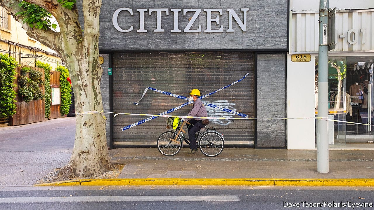 May 5, 2022 - Shanghai, China: A construction woker rides a bicycle by a shuttered Citizan store on Middle Huahai Road during China's worst outbreak of Covid-19 since Wuhan in late 2019/early 2020. (Dave Tacon/Polaris)Credit: Polaris / eyevineFor further information please contact eyevinetel: +44 (0) 20 8709 8709e-mail: info@eyevine.comwww.eyevine.com