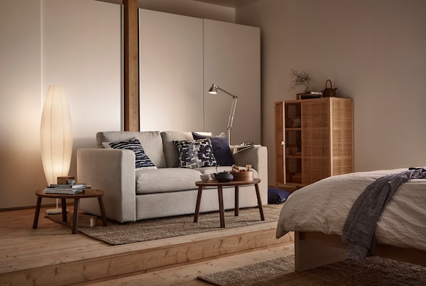 VIMLE sofa in bedroom next to NORDKISA solitaire standalone wardrobe. 