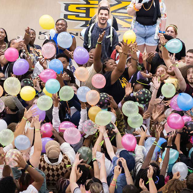 KSU students playing with balloons