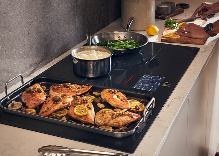he STUDIO electric cooktop burners adjust to fit even your largest sauté pan tout image
