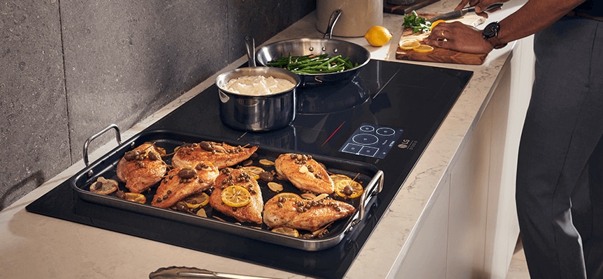 he STUDIO electric cooktop burners adjust to fit even your largest sauté pan tout image