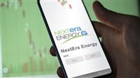 NextEra Energy stock buy or sell on smartphone screen