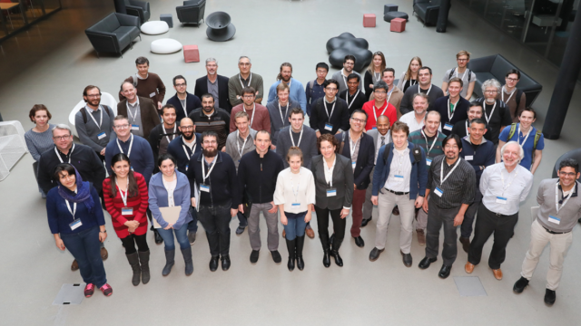 A group shot of researchers at the Swiss JRC