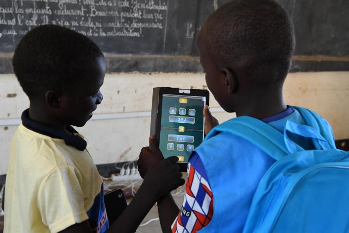 Children attending class with their tablets in Radi school, in the village of Safi, in the South of Niger.