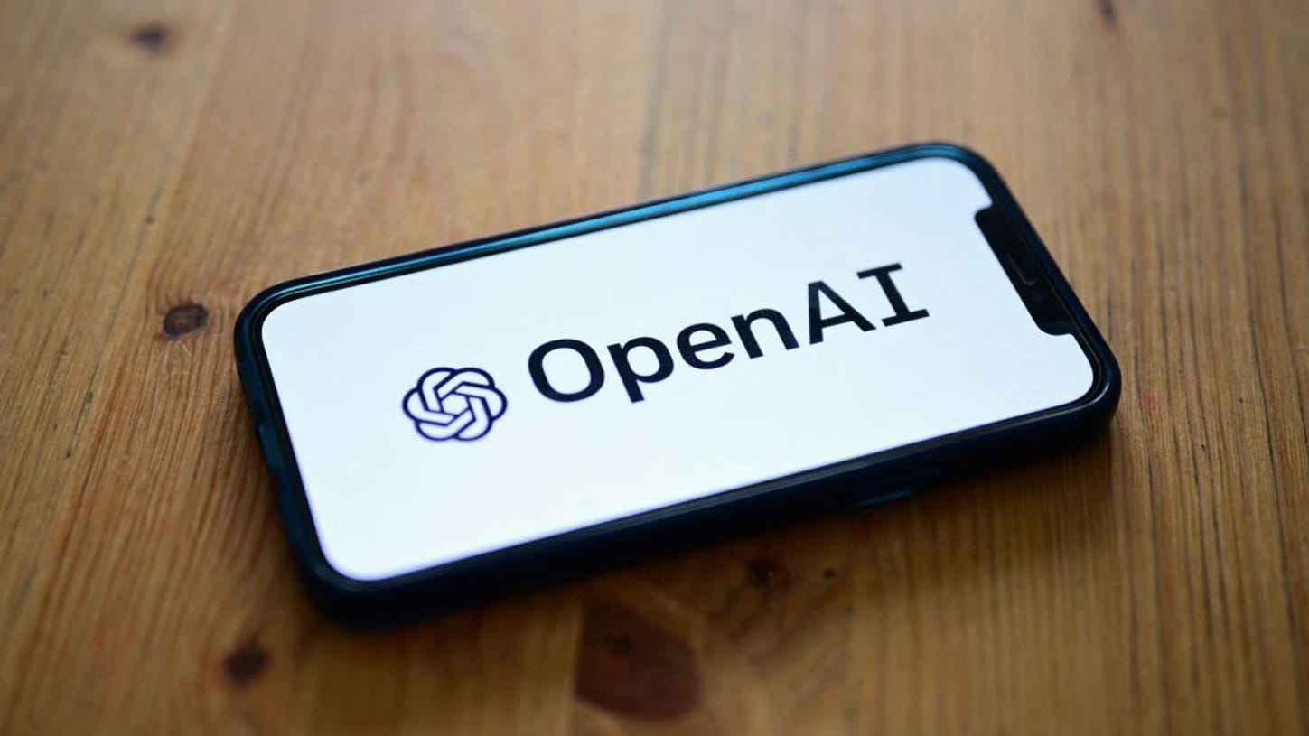A smartphone displaying OpenAI's logo